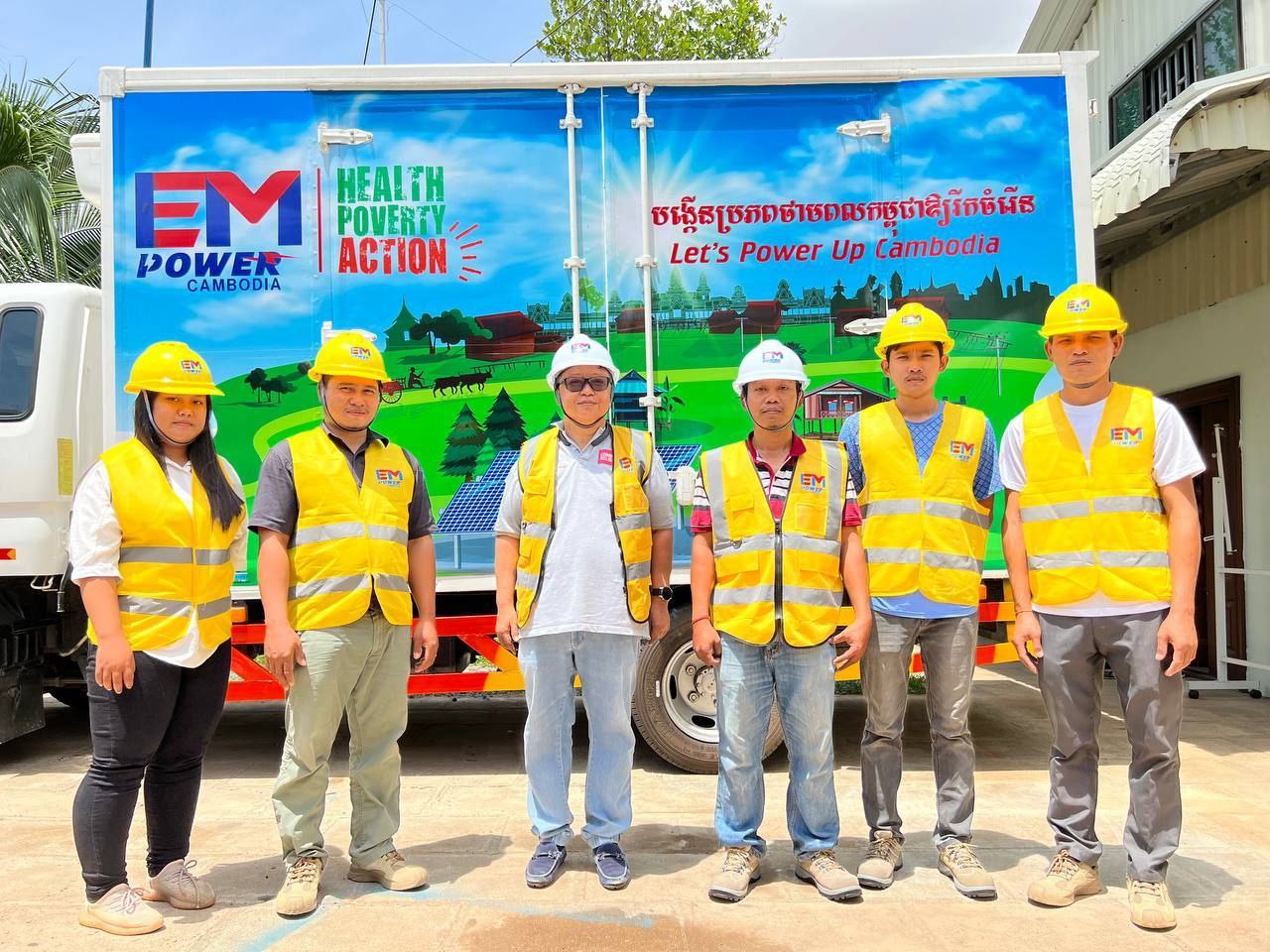 HPA Cambodia team with solar power van